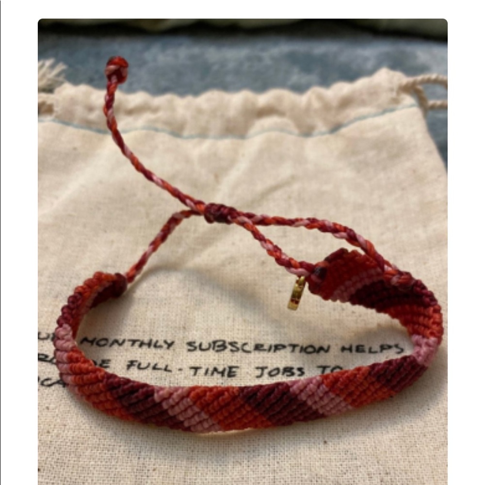 Red and pink flat braided PuraVida bracelet